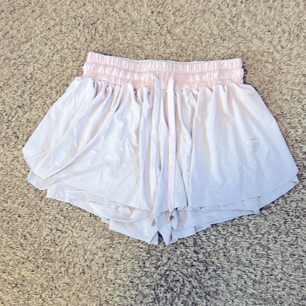 Very light pink, cheer flowy shorts